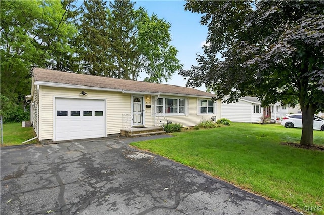 215 Rebecca St, Clay, NY 13212 - ranch-style house with an attached garage, driveway, and a front yard