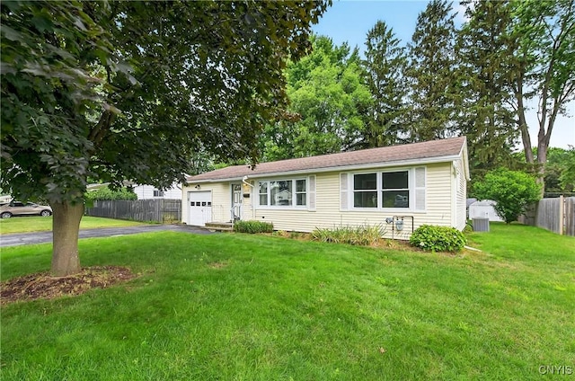 215 Rebecca St, Clay, NY 13212 - view of front facade featuring asphalt driveway and a garage
