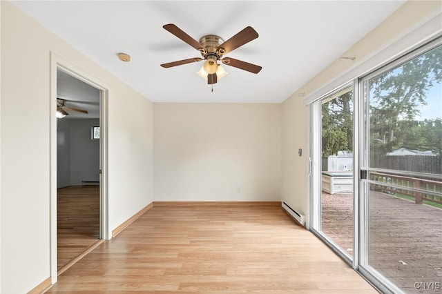 215 Rebecca St, Clay, NY 13212 - spare room with baseboard heating, light wood-style floors, a ceiling fan, and a smoke detector