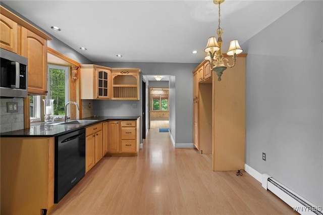 1575 Overhead Rd, Evans, NY 14047 - kitchen with black dishwasher, a baseboard heating unit, light wood-type flooring, stainless steel microwave, and dark countertops