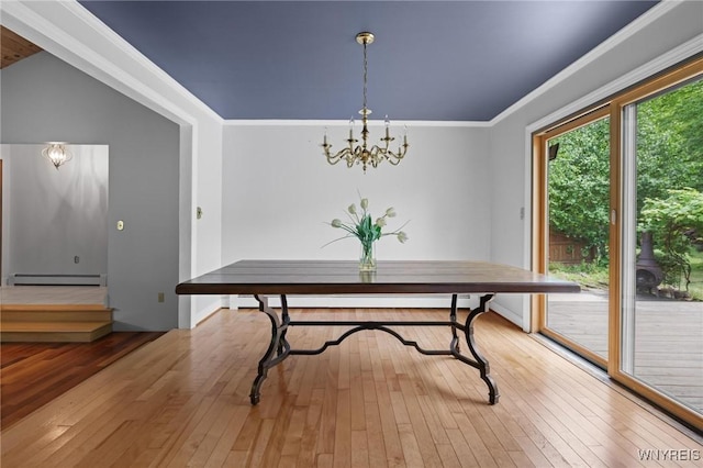 1575 Overhead Rd, Evans, NY 14047 - dining room with a baseboard radiator, hardwood / wood-style floors, a chandelier, and ornamental molding