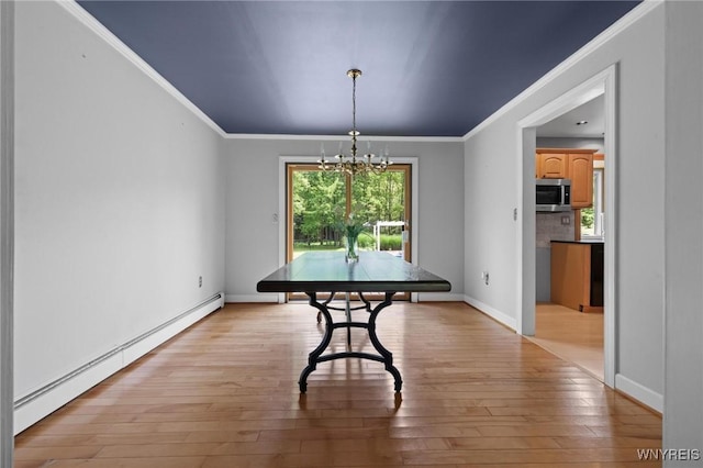 1575 Overhead Rd, Evans, NY 14047 - dining space featuring a baseboard heating unit, a chandelier, light wood-style flooring, and ornamental molding