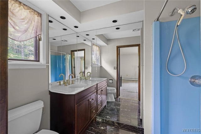 1575 Overhead Rd, Evans, NY 14047 - full bath with marble tiled flooring, double vanity, recessed lighting, a shower with shower curtain, and a baseboard heating unit