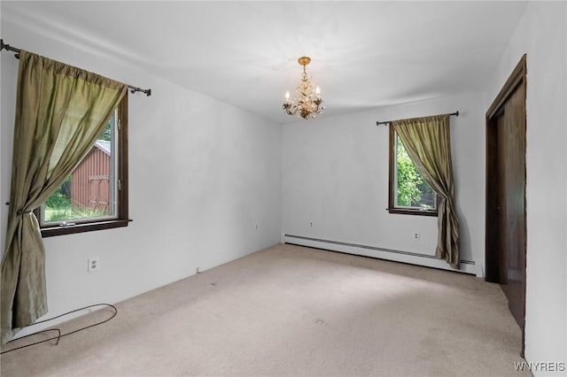 1575 Overhead Rd, Evans, NY 14047 - unfurnished room featuring baseboard heating, carpet, and a chandelier