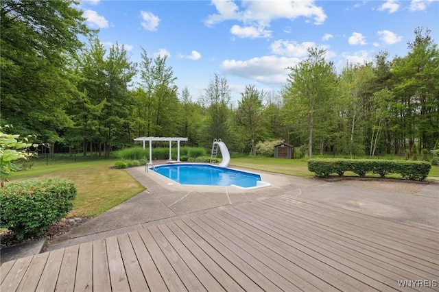 1575 Overhead Rd, Evans, NY 14047 - outdoor pool featuring a water slide, a yard, a storage shed, and a pergola