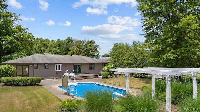 1575 Overhead Rd, Evans, NY 14047 - back of house with a deck, an outdoor pool, a patio, a lawn, and a chimney
