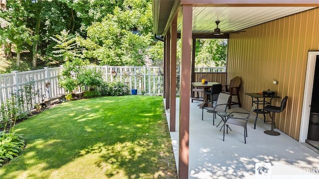 49 Day St, Pomfret, NY 14063 - fenced backyard featuring ceiling fan and a patio area