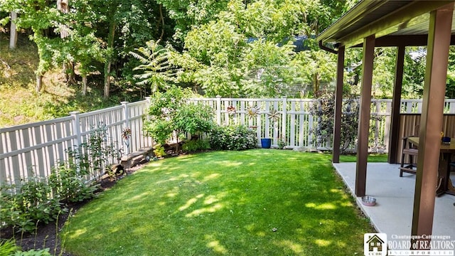 49 Day St, Pomfret, NY 14063 - fenced backyard featuring a patio area