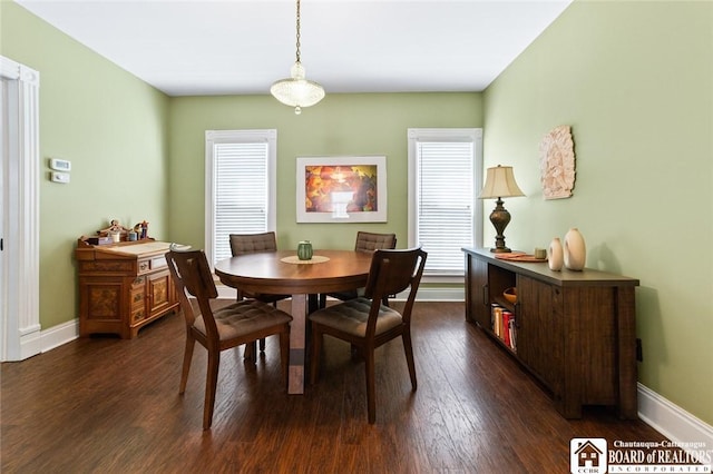 49 Day St, Pomfret, NY 14063 - dining space with healthy amount of natural light and dark wood finished floors