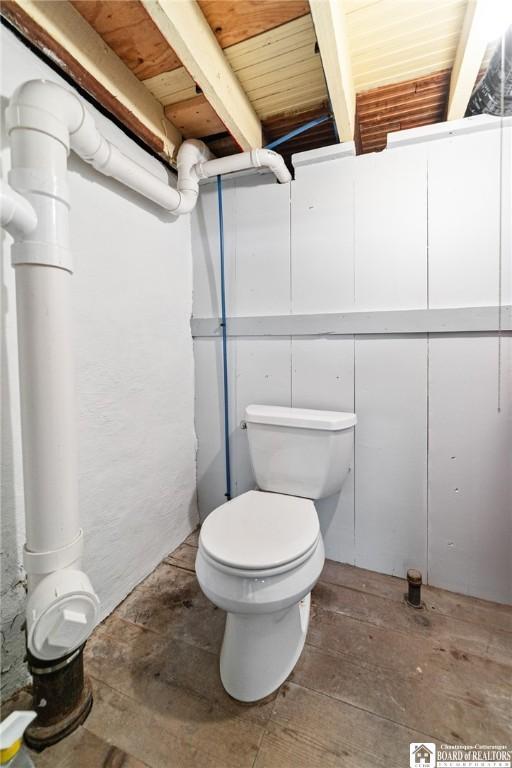 49 Day St, Pomfret, NY 14063 - bathroom featuring toilet and a wooden ceiling with exposed beams