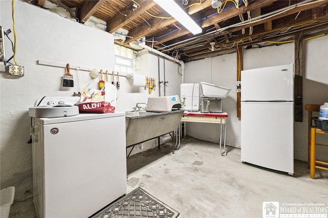 49 Day St, Pomfret, NY 14063 - basement with freestanding refrigerator and washer and dryer
