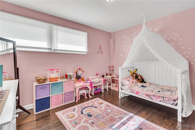 2051 Parker Blvd, Tonawanda, NY 14150 - bedroom featuring wood finished floors and baseboards