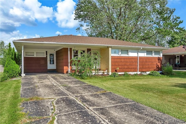 2051 Parker Blvd, Tonawanda, NY 14150 - ranch-style home with a front lawn, driveway, and a carport