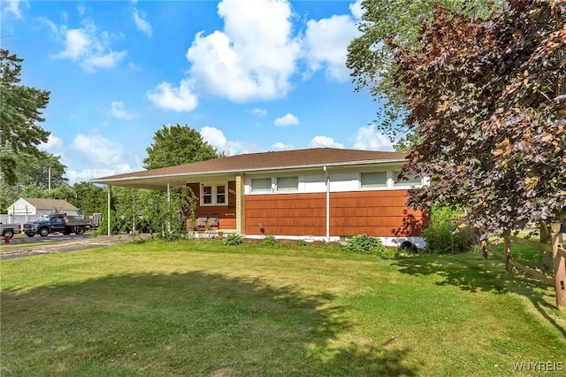 2051 Parker Blvd, Tonawanda, NY 14150 - view of front of house featuring a front lawn