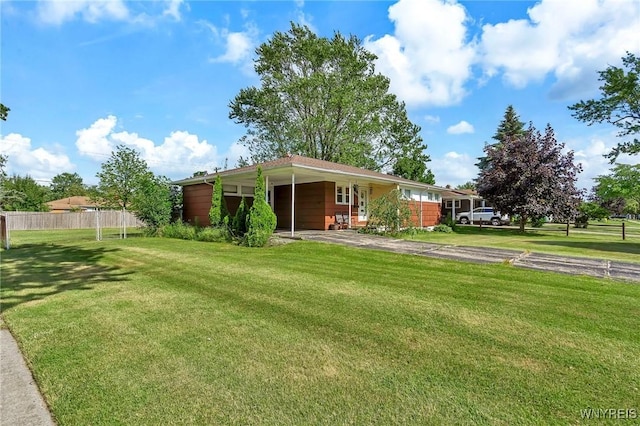 2051 Parker Blvd, Tonawanda, NY 14150 - view of yard with asphalt driveway and an attached carport
