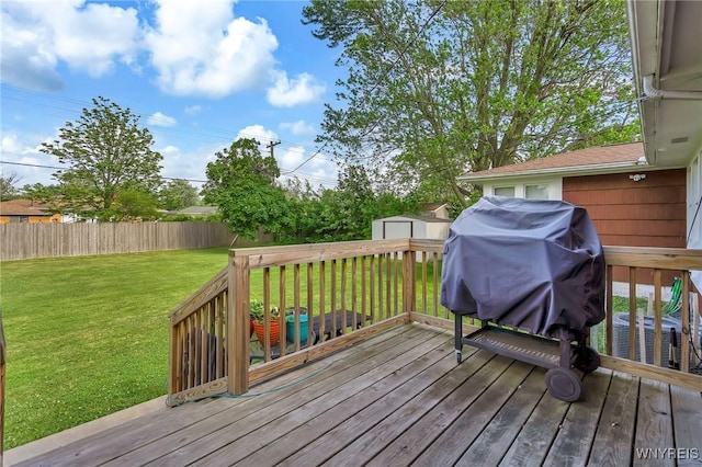 2051 Parker Blvd, Tonawanda, NY 14150 - wooden terrace featuring a storage unit, a fenced backyard, and area for grilling