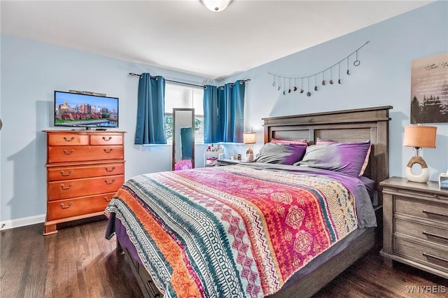 2051 Parker Blvd, Tonawanda, NY 14150 - bedroom with dark wood-style flooring and baseboards