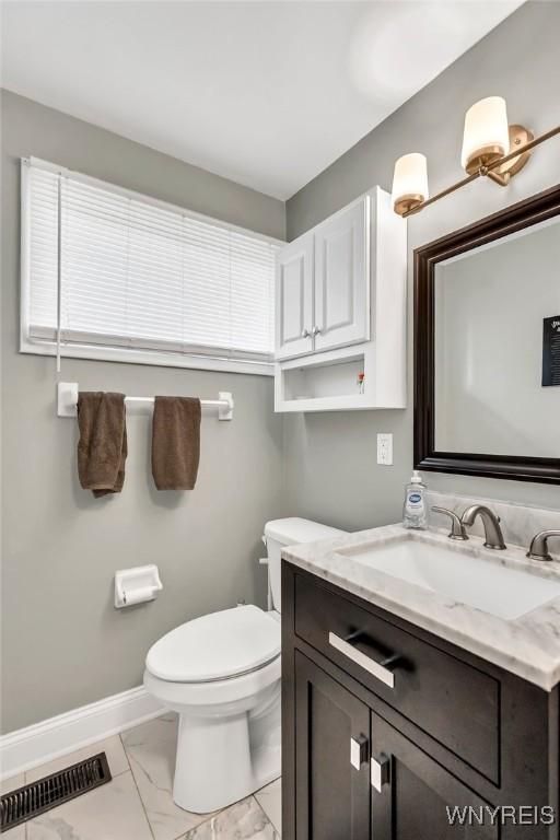 2051 Parker Blvd, Tonawanda, NY 14150 - bathroom featuring marble finish flooring and vanity