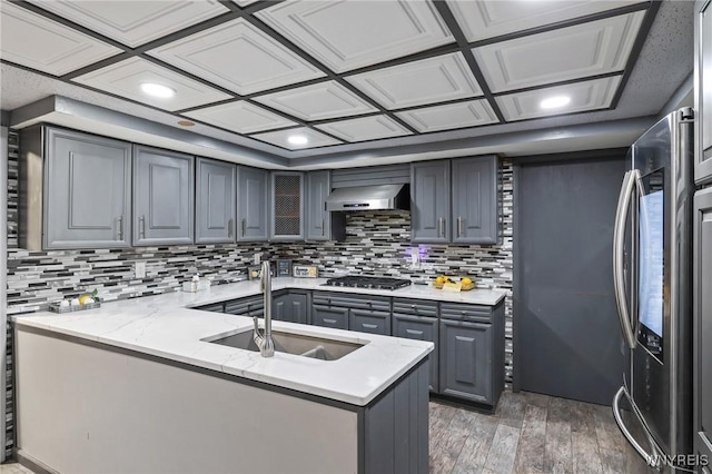 722 College Ter, Niagara Falls, NY 14305 - kitchen featuring stainless steel appliances, gray cabinetry, under cabinet range hood, light wood-type flooring, and recessed lighting