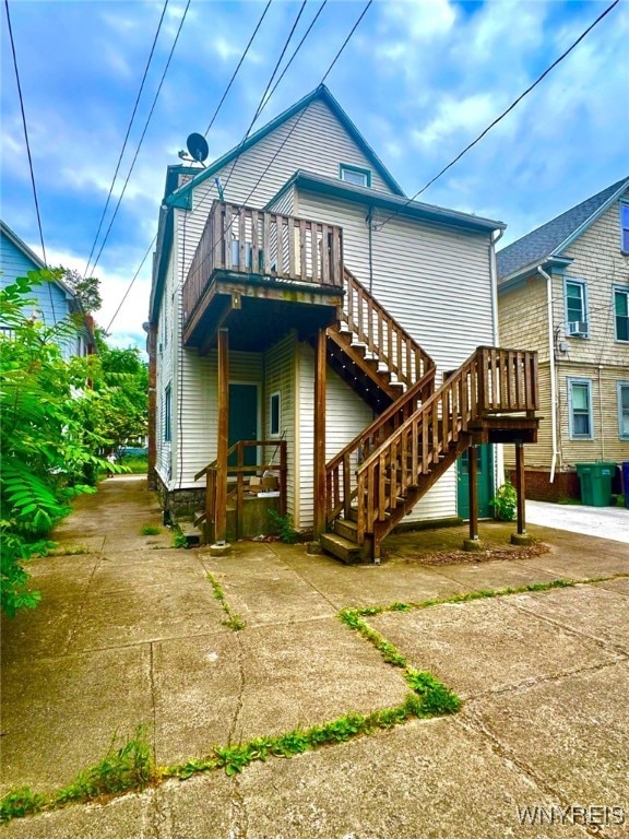 24 Northrup Pl, Buffalo, NY 14214 - rear view of house featuring stairway