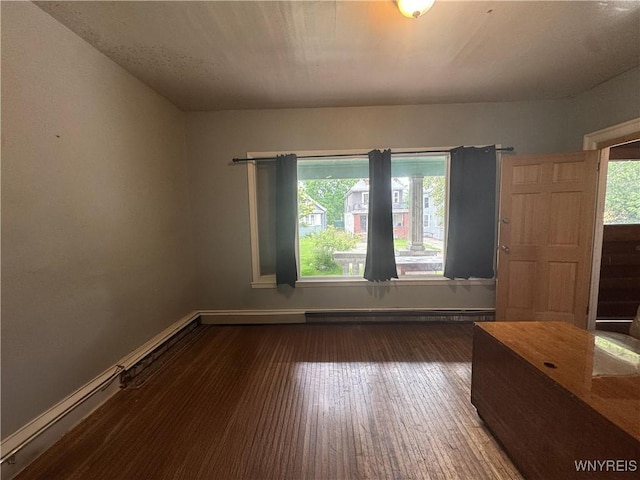 24 Northrup Pl, Buffalo, NY 14214 - empty room featuring wood-type flooring and baseboards