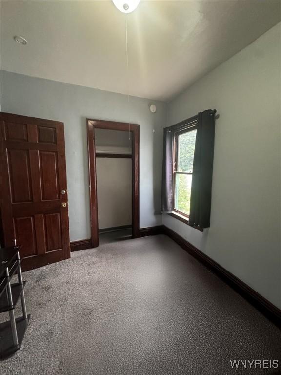 24 Northrup Pl, Buffalo, NY 14214 - unfurnished bedroom with baseboards