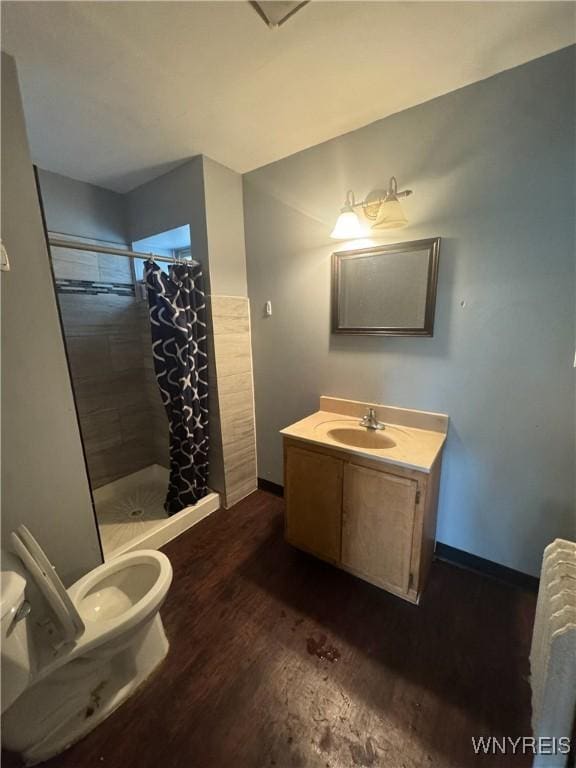 24 Northrup Pl, Buffalo, NY 14214 - bathroom with wood finished floors, a stall shower, and vanity