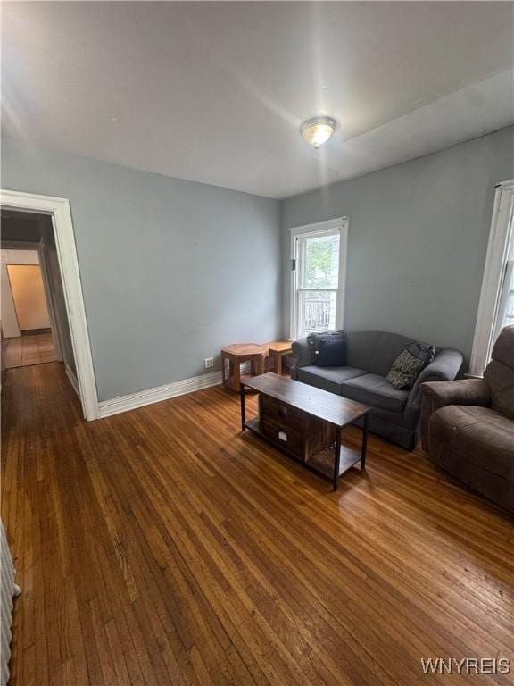 24 Northrup Pl, Buffalo, NY 14214 - living room with dark wood-style flooring and baseboards