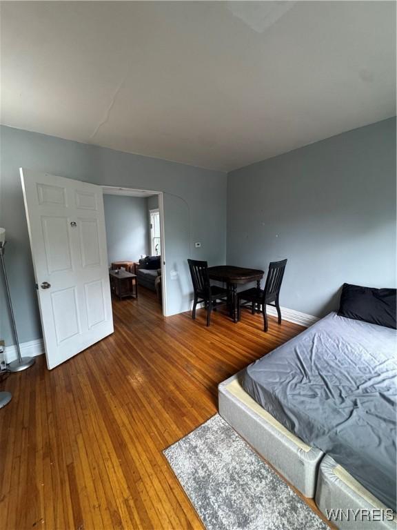 24 Northrup Pl, Buffalo, NY 14214 - bedroom featuring hardwood / wood-style flooring and baseboards