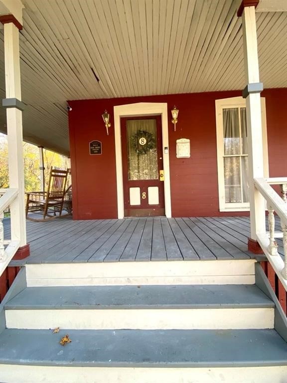 8 Ithaca St, Barton, NY 14892 - entrance to property with covered porch
