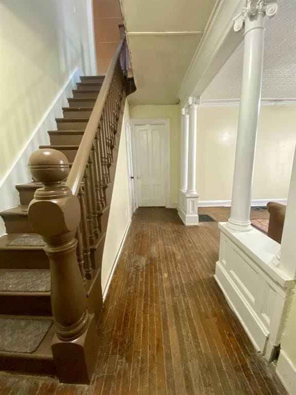 8 Ithaca St, Barton, NY 14892 - stairs featuring hardwood / wood-style flooring, decorative columns, and ornamental molding