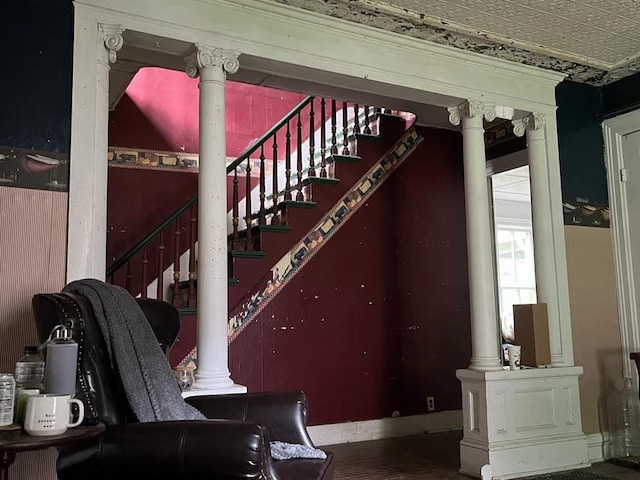 8 Ithaca St, Barton, NY 14892 - staircase featuring decorative columns and wood finished floors