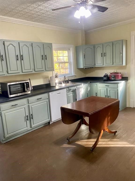 8 Ithaca St, Barton, NY 14892 - kitchen featuring stainless steel microwave, dishwasher, dark countertops, ceiling fan, and crown molding