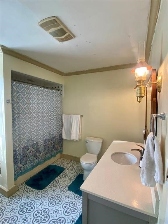 8 Ithaca St, Barton, NY 14892 - bathroom featuring vanity, crown molding, and curtained shower