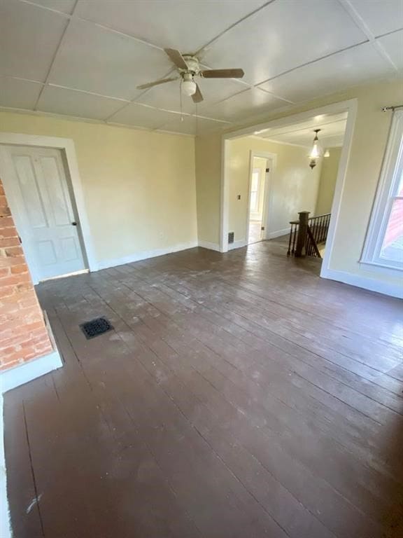 8 Ithaca St, Barton, NY 14892 - unfurnished living room featuring ceiling fan and dark wood-style flooring