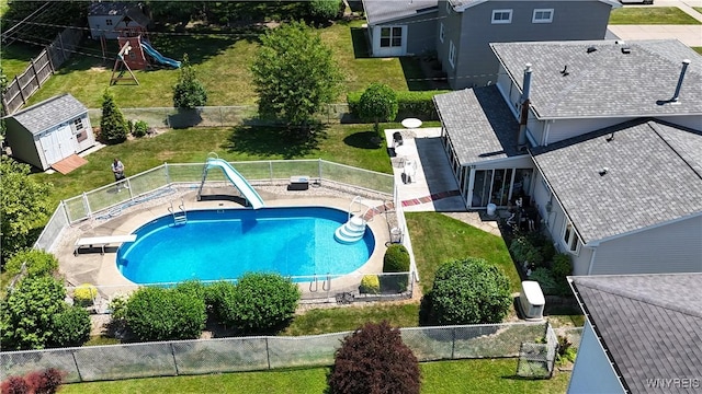 80 Jeffrey Dr, Amherst, NY 14228 - view of swimming pool with a water slide, a diving board, and a fenced backyard