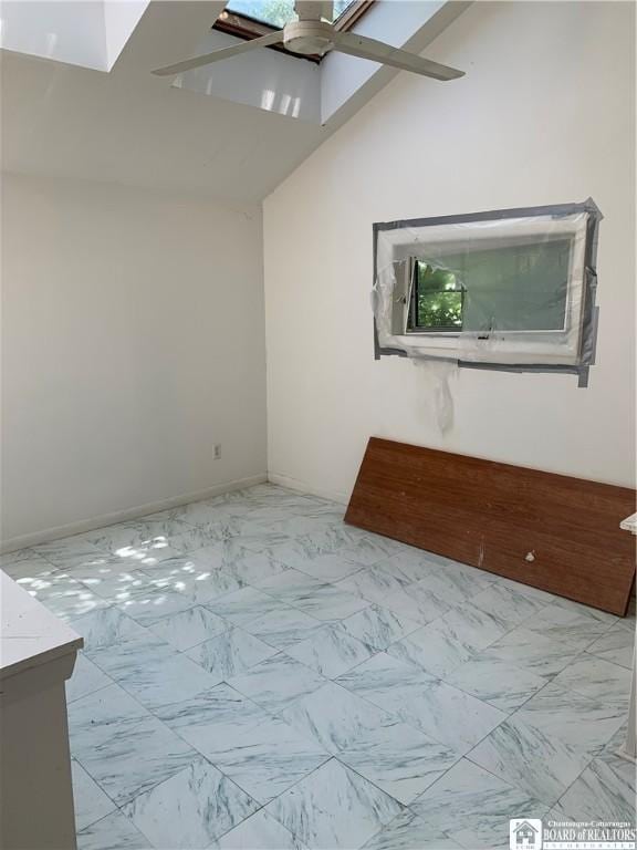 749-753 W Main, Ellington, NY 14732 - unfurnished room with ceiling fan, marble look tile flooring, and lofted ceiling
