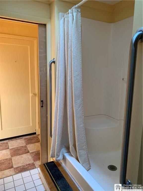 749-753 W Main, Ellington, NY 14732 - bathroom featuring a shower with curtain
