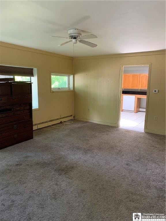 749-753 W Main, Ellington, NY 14732 - spare room with a baseboard radiator, ceiling fan, and carpet floors