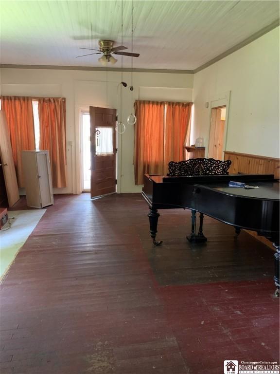 749-753 W Main, Ellington, NY 14732 - entrance foyer with ceiling fan, wood-type flooring, and wainscoting