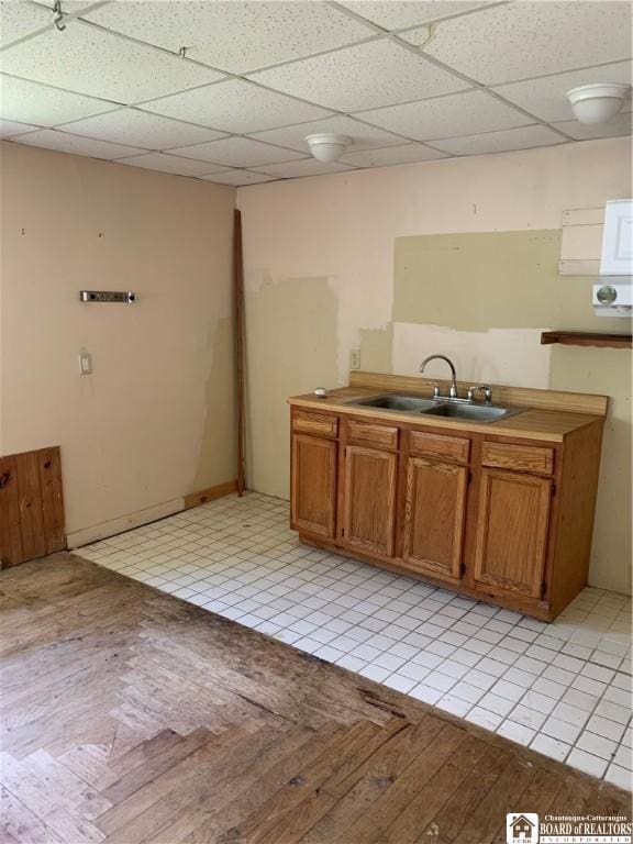 749-753 W Main, Ellington, NY 14732 - kitchen with a paneled ceiling and brown cabinets