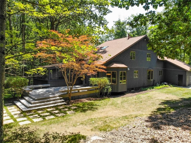2657 Spencer Hill Rd, Corning, NY 14830 - rear view of property with a wooden deck, a lawn, and roof with shingles