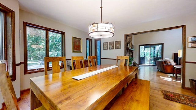 2657 Spencer Hill Rd, Corning, NY 14830 - dining area with wood finished floors and plenty of natural light