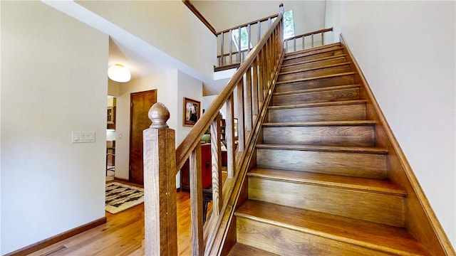 2657 Spencer Hill Rd, Corning, NY 14830 - staircase with wood finished floors and baseboards