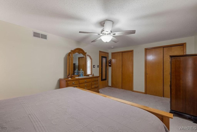 86 Hitching Post Ln, Amherst, NY 14228 - carpeted bedroom featuring multiple closets and ceiling fan