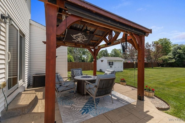 86 Hitching Post Ln, Amherst, NY 14228 - fenced backyard with a gazebo, an outdoor fire pit, a patio, and a shed