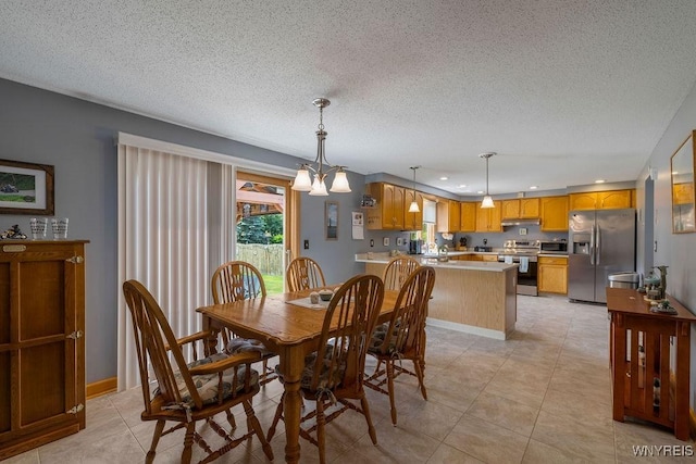 86 Hitching Post Ln, Amherst, NY 14228 - dining space featuring recessed lighting, a textured ceiling, and light tile patterned floors