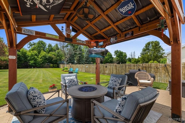 86 Hitching Post Ln, Amherst, NY 14228 - fenced backyard with an outdoor fire pit, a gazebo, and a patio