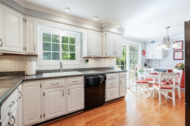 22 Red Leaf Dr, Chili, NY 14624 - kitchen featuring dishwasher, ornamental molding, a chandelier, white cabinetry, and dark countertops
