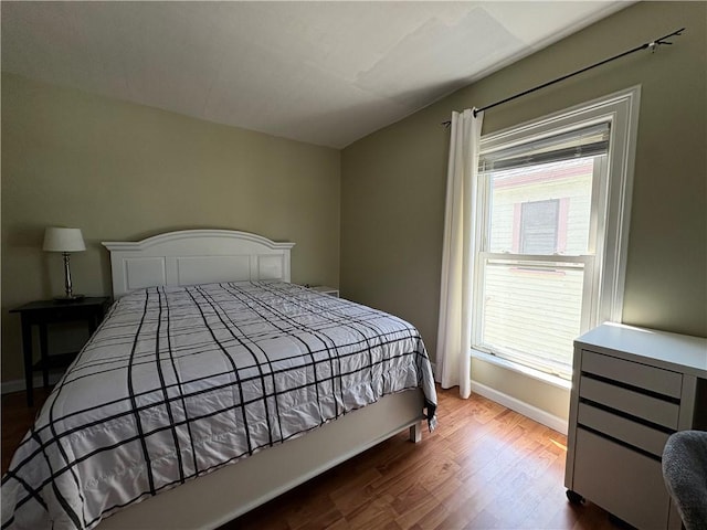 7 E St, Oneonta, NY 13820 - bedroom featuring wood finished floors and baseboards